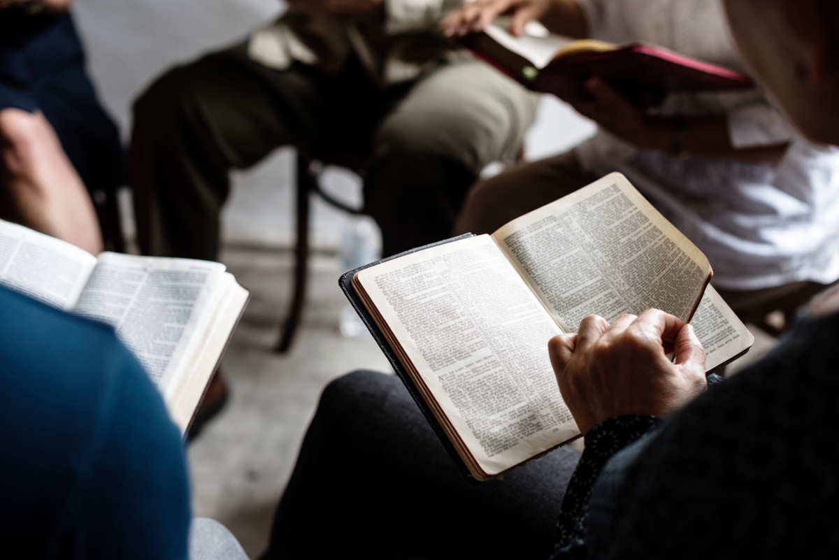 group of christians reading bible